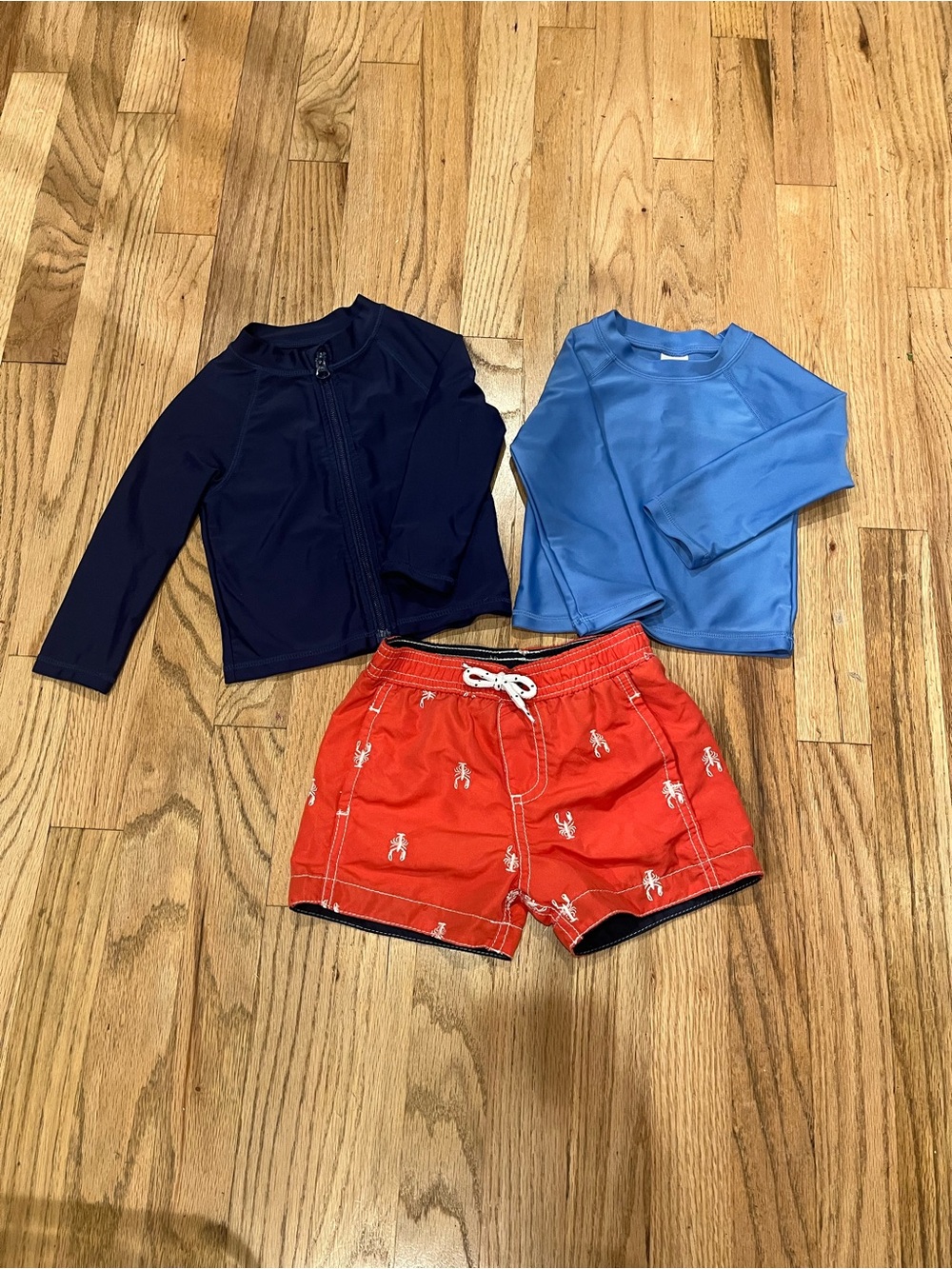 Bundle of 3 swim/sun 12 mos - swim trunk, zip up navy & light blue rash-guards